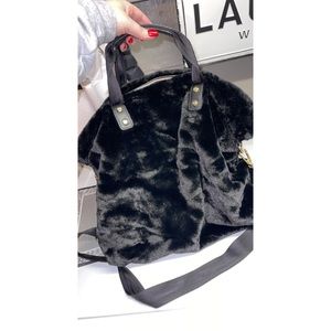 Faux fur Calvin Klein purse worn once